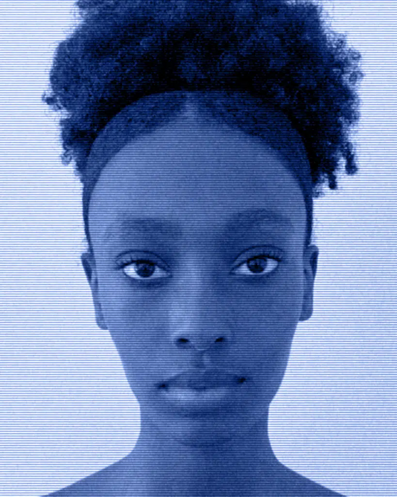 A young woman with a blue background