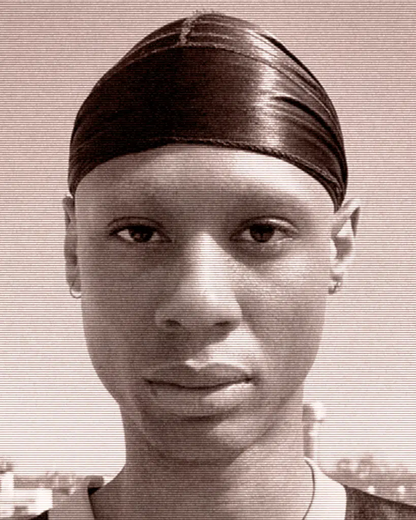 A man with a black head band on.