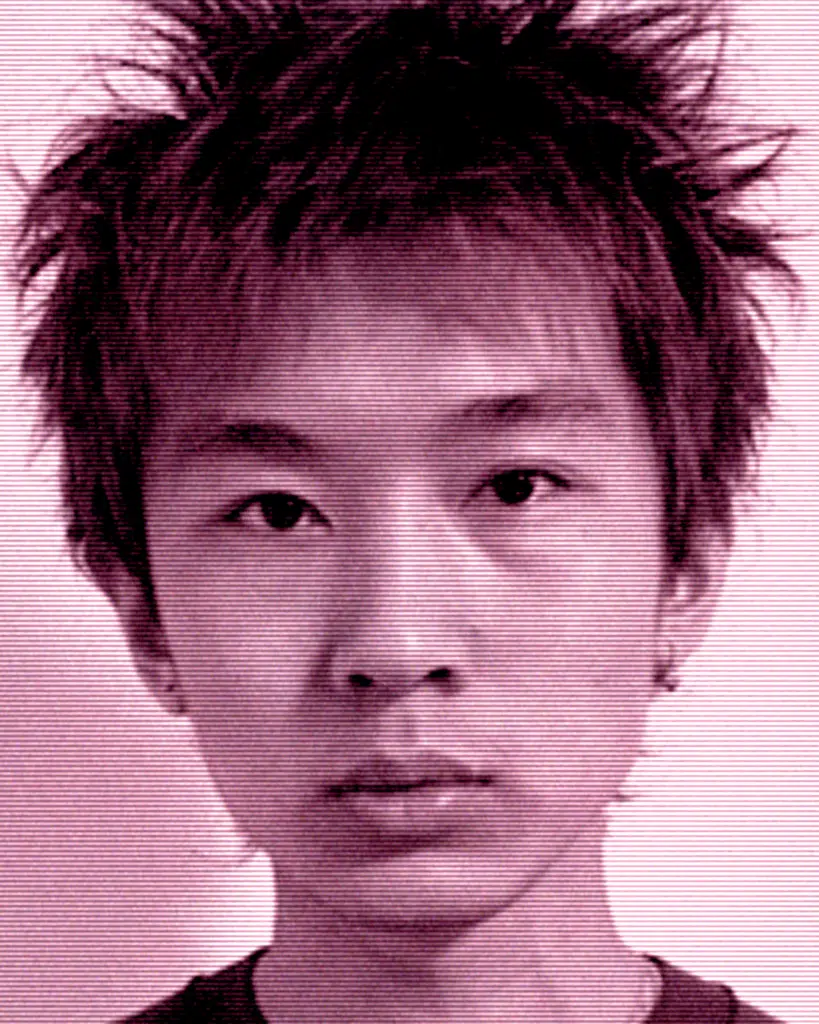 A young man with spiky hair and an asian look.