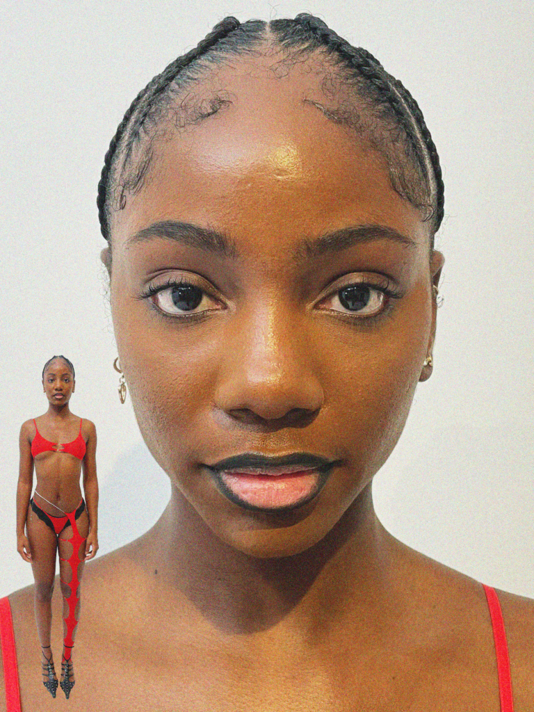 A woman in red bikini standing next to another woman.