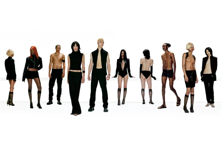 A group of people standing in various poses.