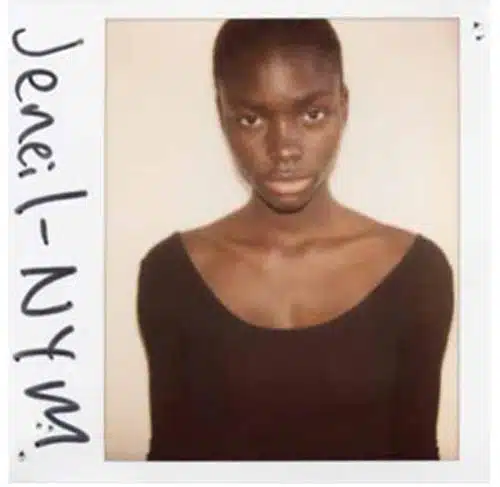 A polaroid of a woman with short hair.