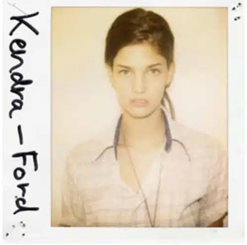 A polaroid of a person with a name written on it.