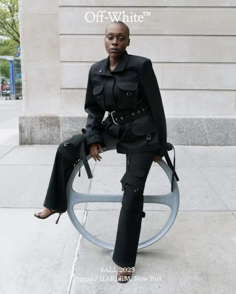 A woman sitting on top of a chair.