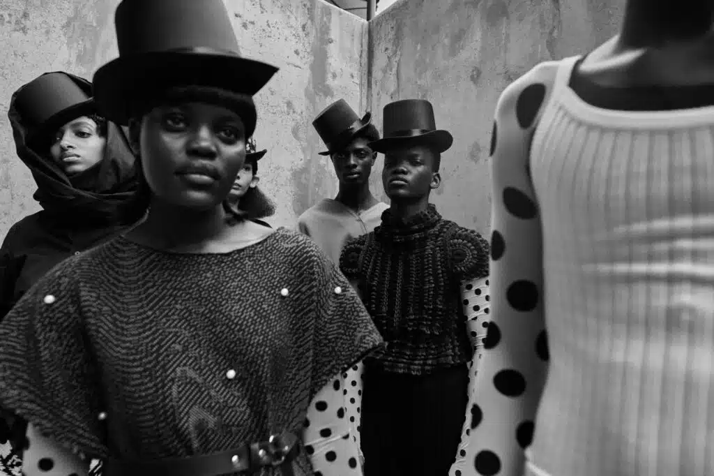 A group of people in hats and polka dots.