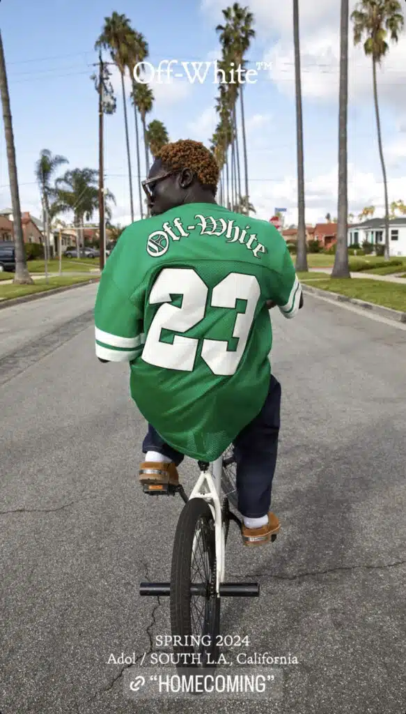 A man riding on the back of a bike.