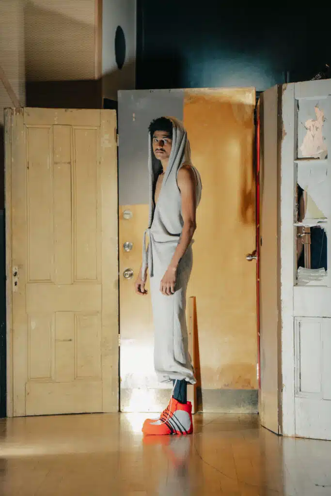 A person standing in front of a door