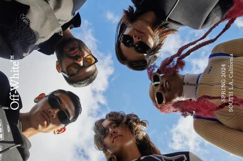 A group of people standing in the middle of a circle.